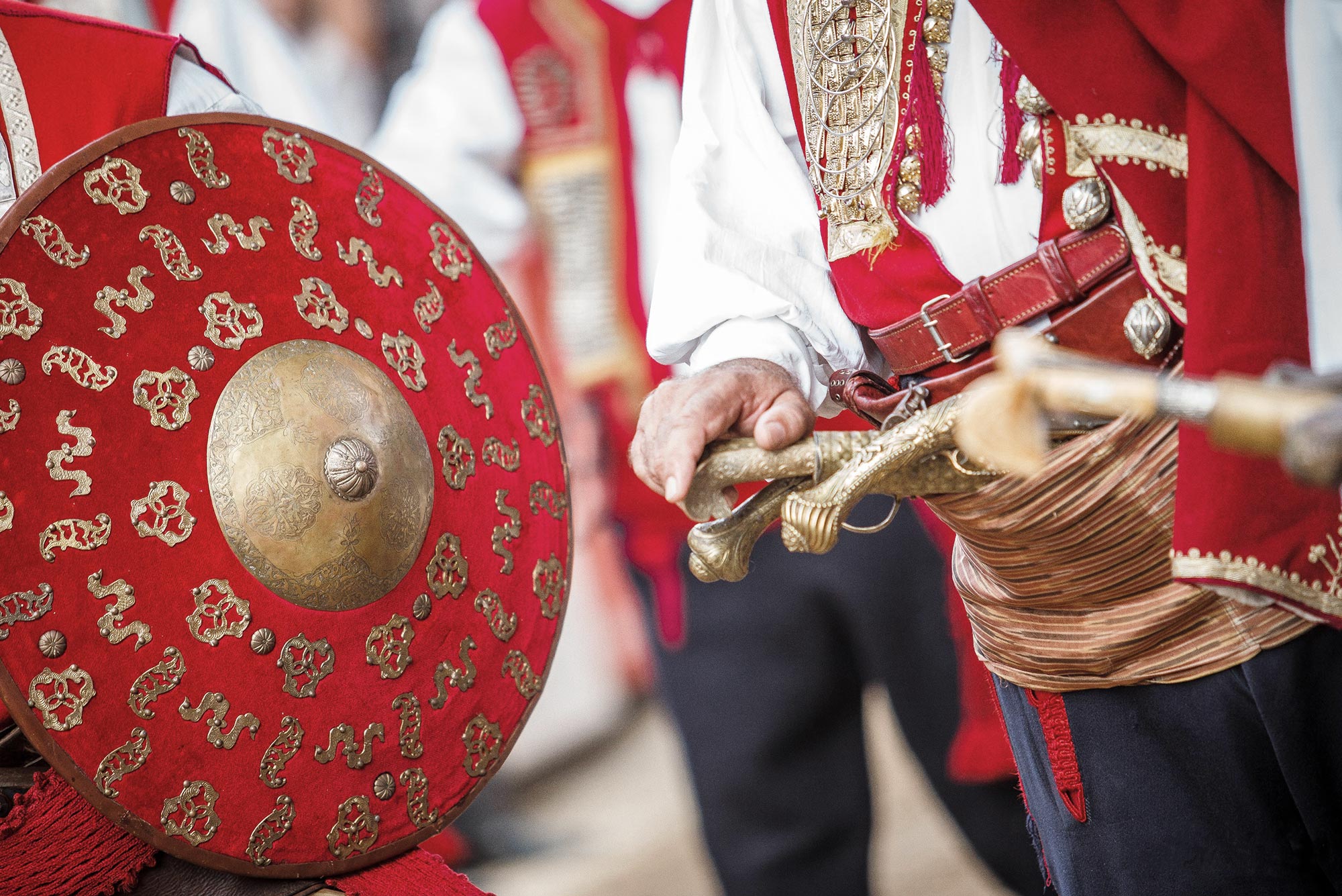 Alka dress and weapons